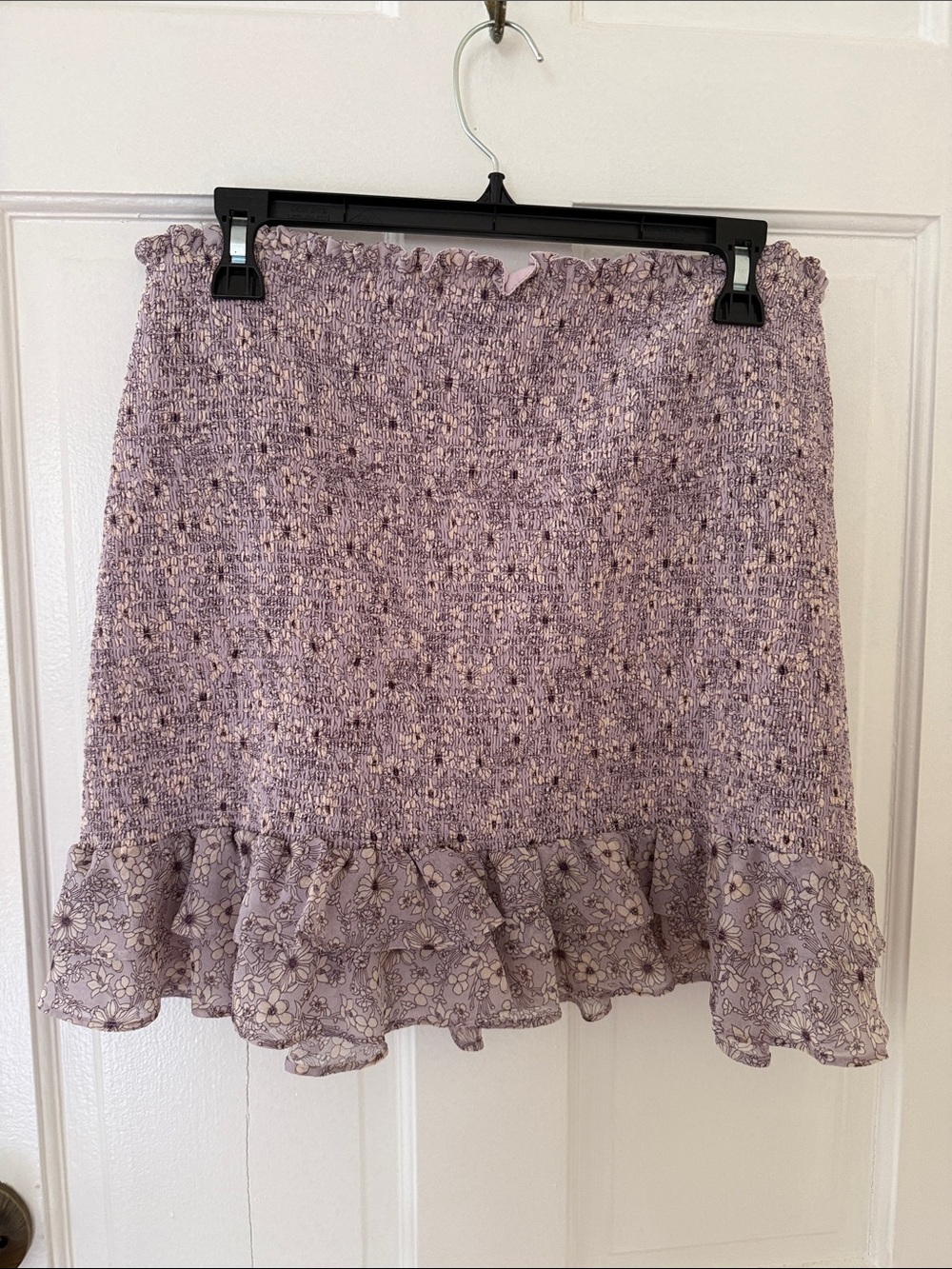 1. State Lavender Smocked Mini Skirt with Floral Ruffle